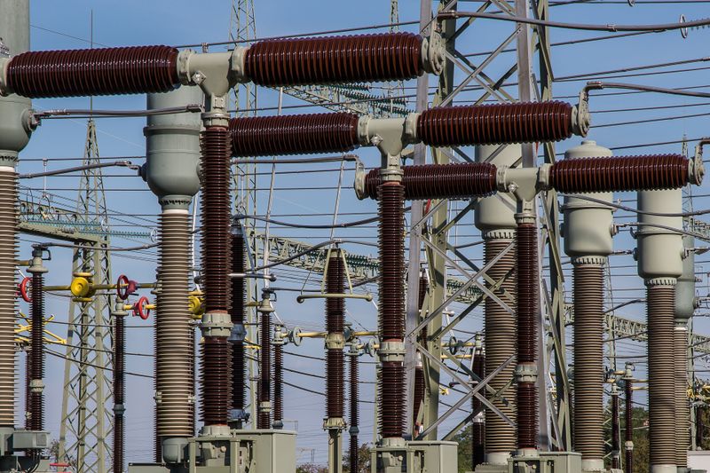 High-voltage electrical substation with transformers and power lines
